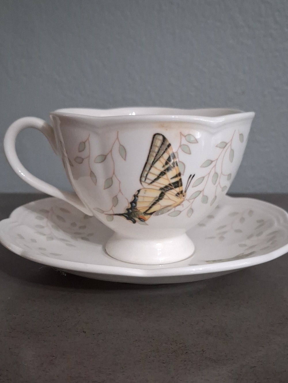 Lenox White Porcelain Teacup and Saucer with Subtle Yellow Accents